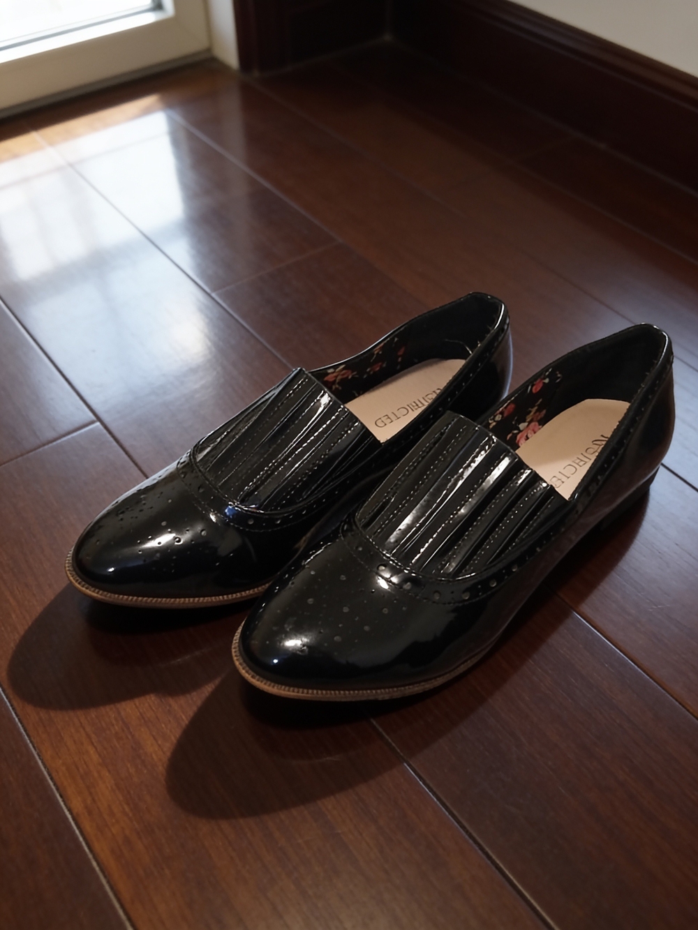 Restricted Black Patent Slip-On Loafers with Fringe Detail
